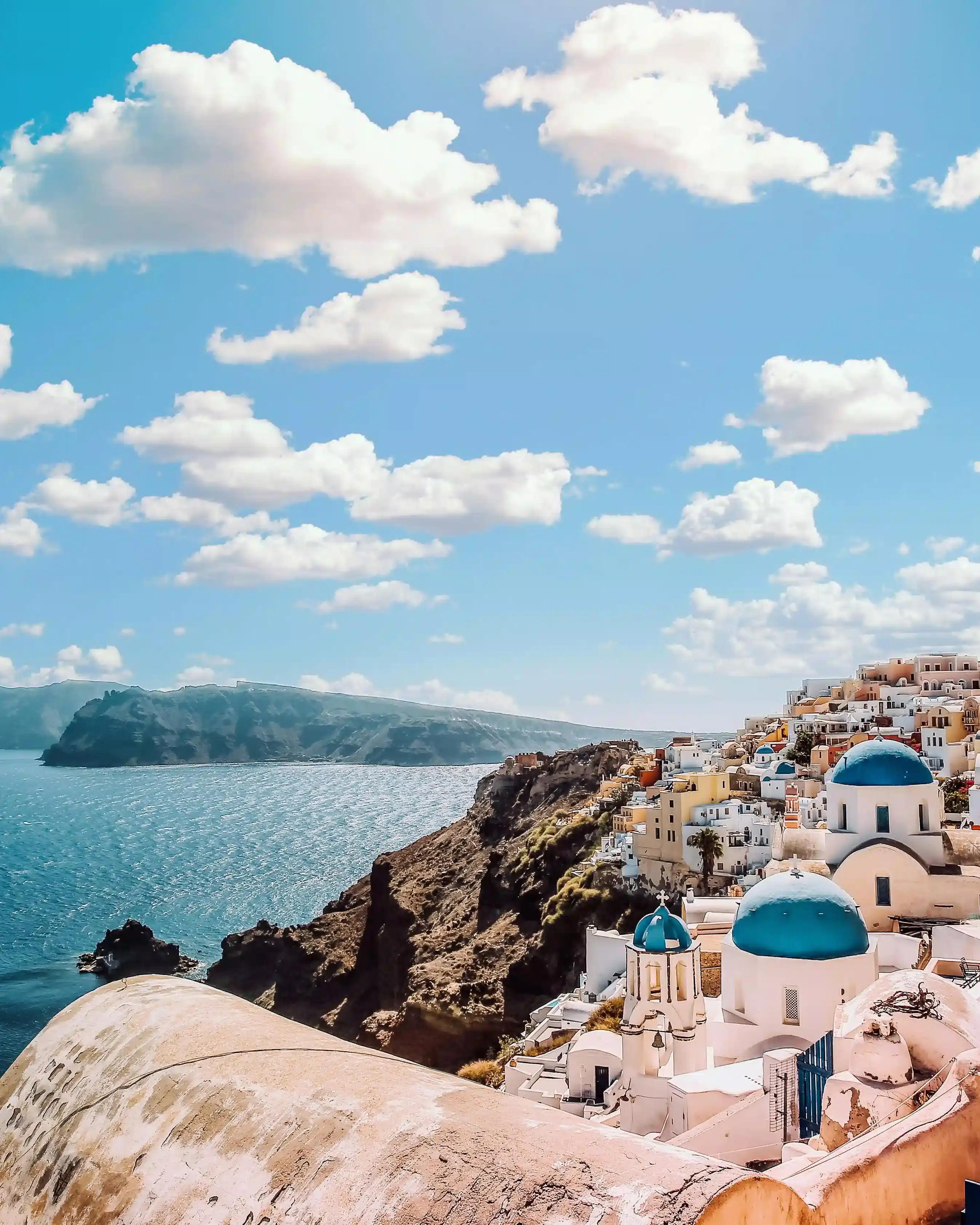 Mykonos city with whitewashed buildings and the Aegan sea